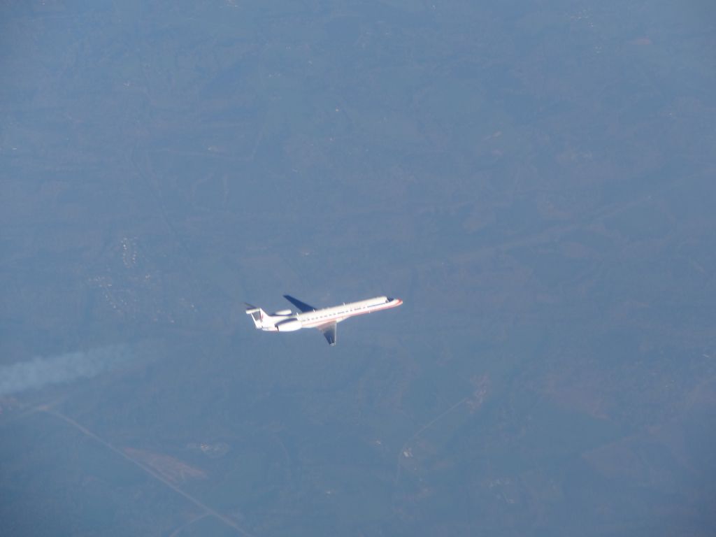 — — - American Eagle EMB 145s at 37000 feet with another one flying just below