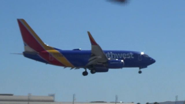 Boeing 737-700 (N706SW) - Landing over the Threshold