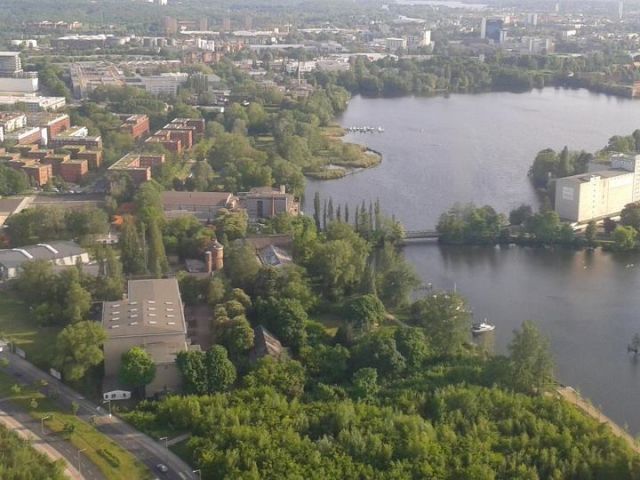 — — - Outskirts of Berlin flying low towards Tegel airport.