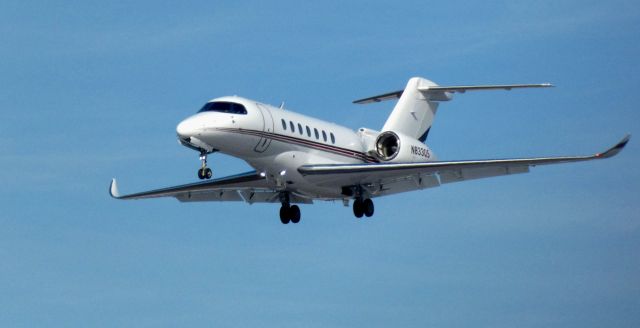 Cessna Citation Longitude (N833QS) - About to touch down is this 2022 Cessna 700 Citation Longitude in the Winter of 2025.