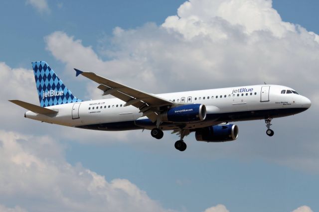 Airbus A320 (N649JB) - "Fancy Meeting Blue Here" * August 23, 2011