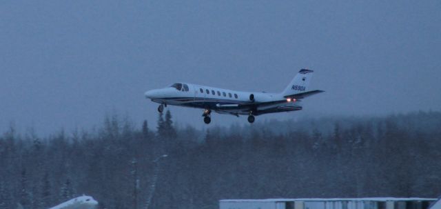 — — - Citation retracting gear on climb out.