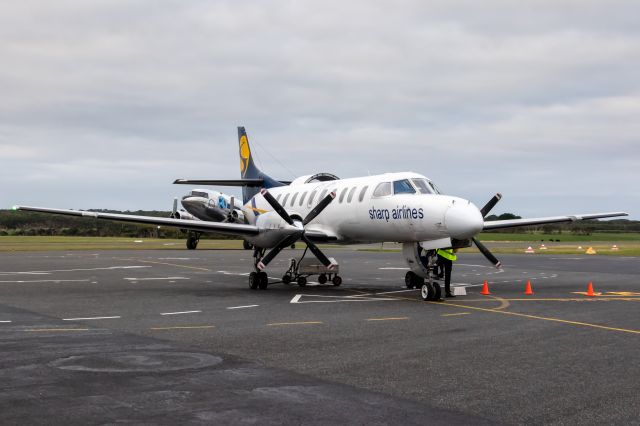 Fairchild Dornier SA-227DC Metro (VH-SWK) - VH-OVM hiding behind VH-SWK on a grey day at King Island