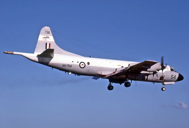 A9754 — - AUSTRALIA - AIR FORCE - LOCKHEED P-3C ORION - REG A9-754 / 54 (CN 285D-6552) - EDINBURGH RAAF BASE ADELAIDE SA. AUSTRALIA - YPED (9/10/1984) 35MM SLIDE SCANNED WITH A EPSON V700 PERFECTION FLATBED SCANNER AT 6400 DPI.