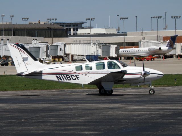 Beechcraft Baron (58) (N118CF) - A Baron taxis to TAC Air (an FBO) at Blue Grass Airport (KLEX)...