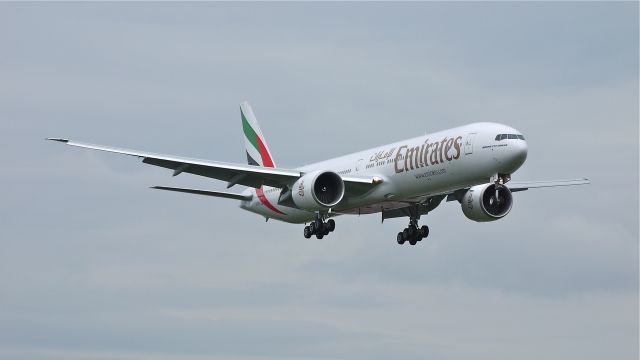 BOEING 777-300 (A6-EGU) - BOE199 (LN:1028) on final approach to runway 16R and completion of its maiden flight on 7/2/12.