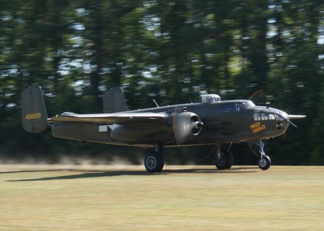 North American TB-25 Mitchell (N7947C) - B-25 Wild Cargo on takeoff. An amazing Warbirds over the Beach 2021 airshow at Jerry Yagen’s Military Aviation Museum at Pungo, VA near Virginia Beach, 2-3 October 2021. If you’ve never attended one of his airshows, you ought to check it out. Multiple formations of US Army Air Corps, US Navy, RAF, and German aircraft. With Covid, this show was a combined WWI, WWII, etc. airshow. 