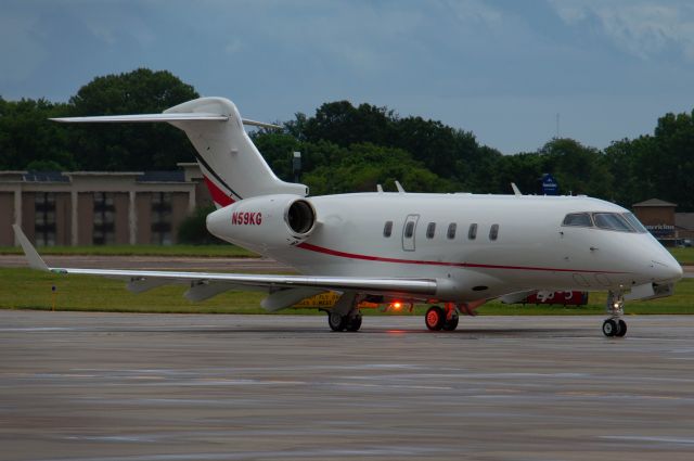 Bombardier Challenger 300 (N59KG) - Here N59KG is taxing to the active runway. Photo taken July 9, 2020 with Nikon D3200 at 185mm.