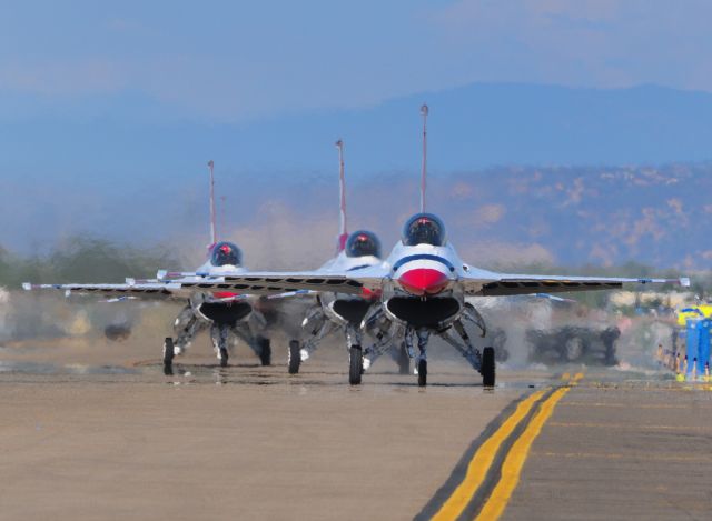 — — - USAF Thunderbirds taxi up the ramp off runway 22 play follow the leader after completing a demonstration at Capitol Air Show Mather field, in Rancho Cordova, CA.