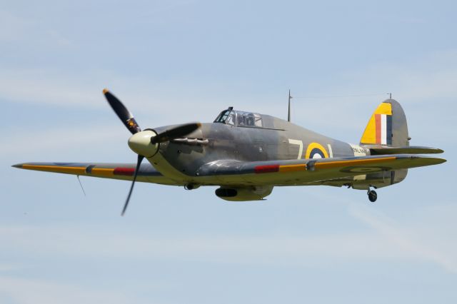 — — - Flypast of a Hawker Sea Hurricane at Old Warden Aerodrome, part of the Shuttleworth Collection.