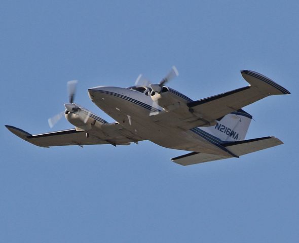 Cessna 421 (N216WA) - Taking off from the Burbank Airport.