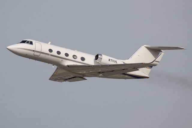 Gulfstream American Gulfstream 2 (N711VL) - Macon County Greyhound Park Inc's 1972 Grumman Gulfstream G-1159 (G-II) N711VL climbing out from RWY 25L.  [KLAX - 01-08-2010]