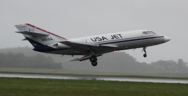 Dassault Falcon 20 (N811AA) - A USA Jet Dassault / SUD Fan Jet Falcon Series D departing Runway 18 at Pryor Field Regional Airport, Decatur, AL, during a rain squall from Subtropical Storm Alberto  - May 29, 2018.