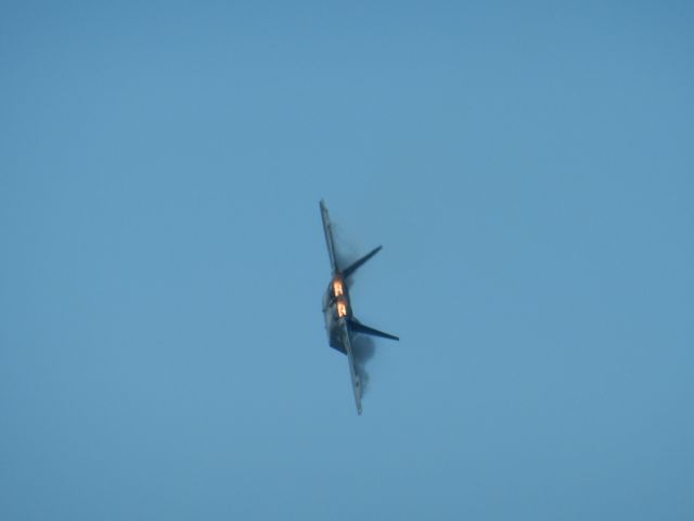 Lockheed F-22 Raptor — - An F-22 Raptor Ignites Afterburner During A High Speed Turn