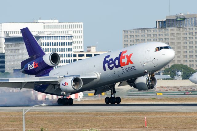 McDonnell Douglas DC-10 (N396FE) - Touchdown on 24R. July 6,2014.