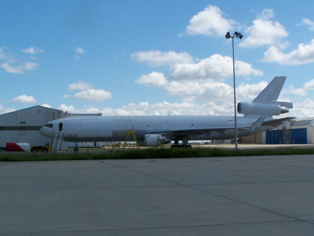 Boeing MD-11 (N296UP) - Parked outside the Leading Edge hanger waiting to get current UPS paint scheme.