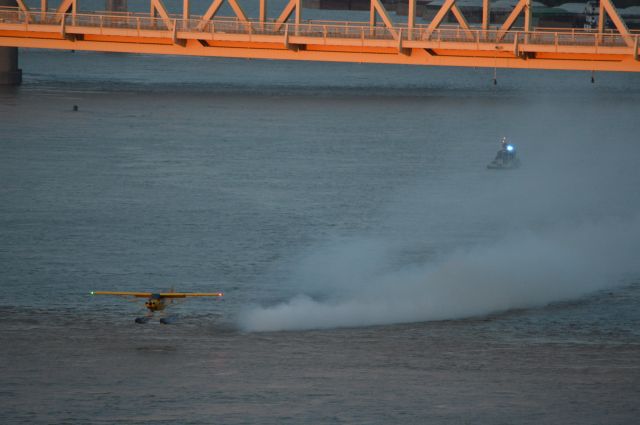 Piper L-21 Super Cub (N526CC) - The cops are after him! (just kidding). Police boat making way for the Fireworks barge. Thunder Over Louisville 2024