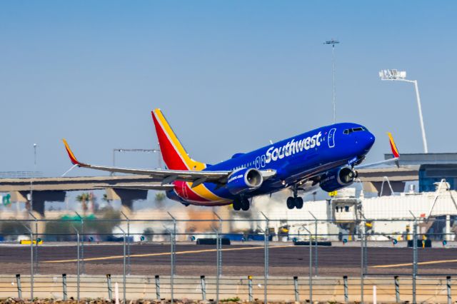 Boeing 737-800 (N7739A) - A Southwest Airlines 737-800 taking off from PHX on 3/4/23. Taken with a Canon R7 and Canon EF 100-400 L II lens.