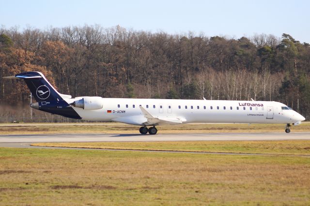 Canadair Regional Jet CRJ-900 (D-ACNM) - A Lufthansa CityLine Mitsubishi CRJ-900 taking off from Frankfurt Airport.br /br /Location: Viewpoint "West Runway"/Aussichtspunkt "Startbahn West".br /Date: 13.02.23 (dd/mm/yy).