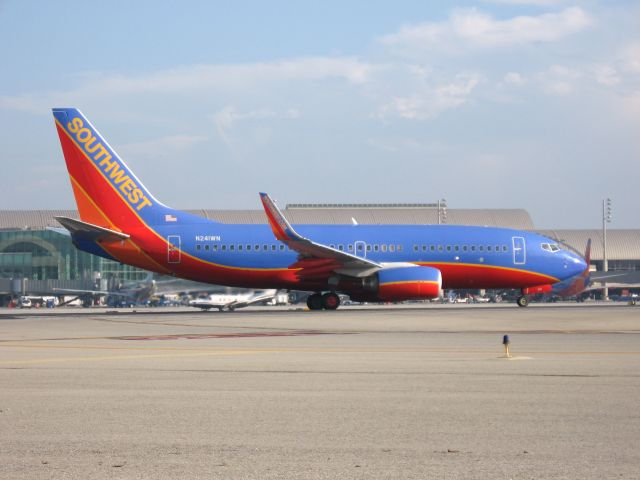 Boeing 737-700 (N241WN) - Holding on RWY 19R