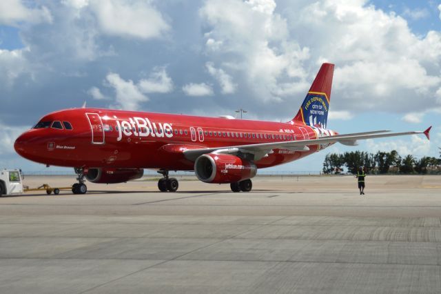 Airbus A320 (N615JB) - jetRed bka "Blue Bravest" finally paid a visit to St. Maarten. Many thanks to all my friends for the update so I can get this bird. Seen here pushing back on the return flight to Boston