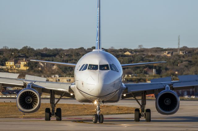 Airbus A319 (N831UA) - Exiting 31L