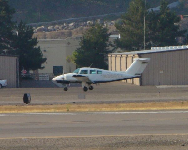 Beechcraft Duchess (N3692X) - Another trainer floating down 27R