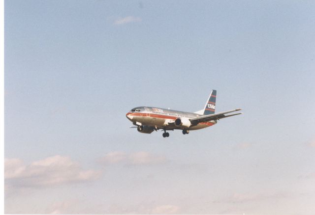 Boeing 737-700 — - USAir Boeing 737 approaching runway 33L at KBWI, late 1996