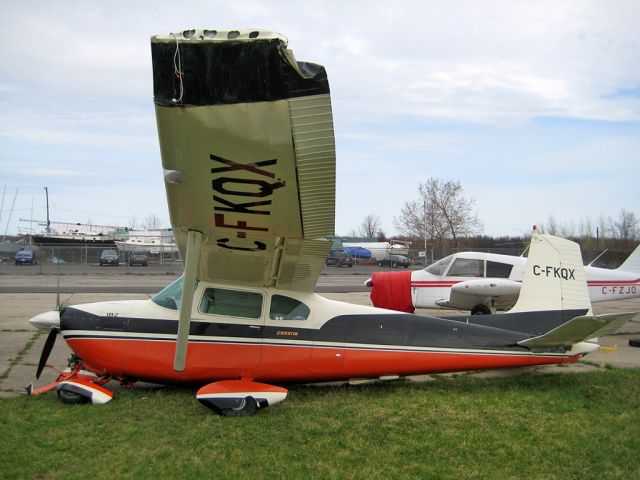 Cessna Skylane (C-FKQX) - This 1958 Cessna 182A was ripped from it tie-downs by high winds or small F0 Tornado on April 25, 2009.  The wings are folded like paper and the landing gear was sheared off.  One of 11 write-offs from this storm.