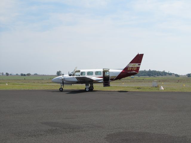 Cessna 310 (VH-FUI) - FUI at Narrabri loading up for Moranbah.