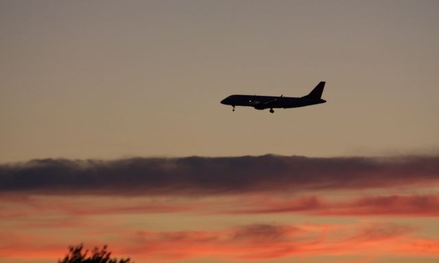 Embraer ERJ 175 (N244JQ) - This Delta Connection Embraer about to land 22L with a beautiful sunset in back on 7/28/20. 