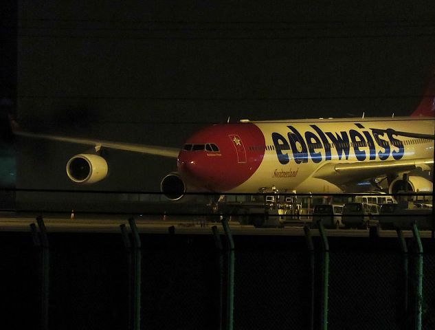 Airbus A340-300 (HB-JMG) - I took this picture on Sep 12, 2018.br /The plane that flew from this ZRH to NRT is the Charter s WK 2018 flight. I photographed the state of the HB-JMG that was staying but unfortunately the part of the tail wing was obstructed by obstacles and I could not show the whole picture of the plane. The front car is also an eyesore.