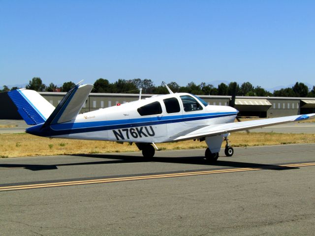 Beechcraft 35 Bonanza (N76KU) - Taxiing to ramp