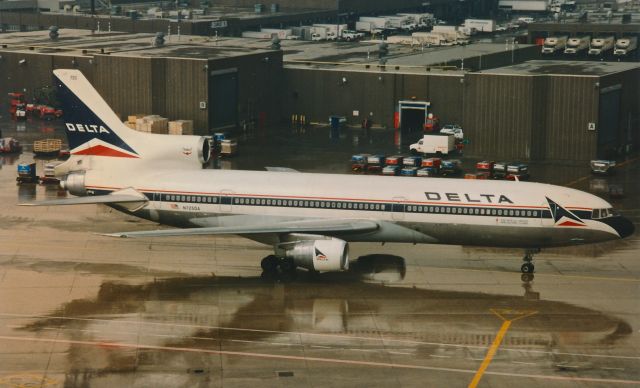 Lockheed L-1011 TriStar (N725DA) - Taken late nineties, early 2000s. This was a rare visitor to YYZ even then. Scanned print.