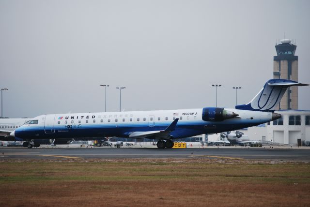 Canadair Regional Jet CRJ-700 (N501MJ) - In position runway 18L - 10/23/09