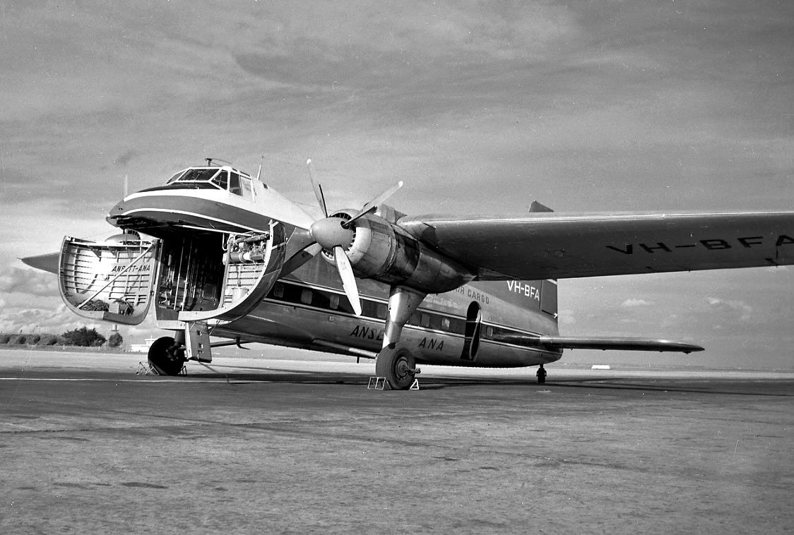 VH-BFA — - Awaiting cargo at Adelaide in May 1962 from Geoff Goodall collection