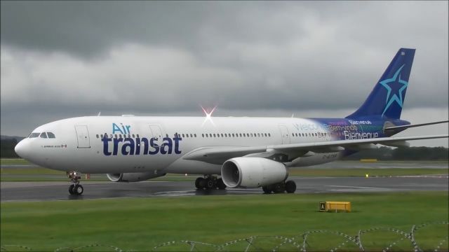 Airbus A330-200 (C-GTSR) - cloudy and raining day in Manchester, A332 Air Transat just landed from Toronto CYYZ