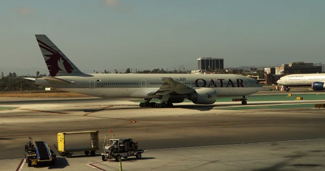 BOEING 777-200LR (A7-BBE) - 8/28/18 on Txy E for Rwy 24L