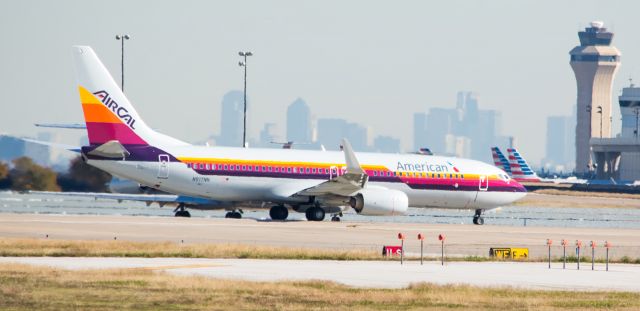 Boeing 737-700 (N917NN) - 12/03/2015 - American N917NN B737 wearing Air Cal livery KDFW - Sorry for the hazy picture, but thought it was worth posting