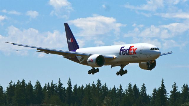 Boeing 777-200 (N893FD) - BOE241 on short final to Rwy 34L to complete a B1 flight on 8.13.19. (B777-FS2 / ln 1616 / cn 41736).