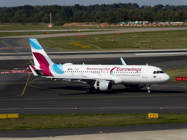 Airbus A320 (D-AEWM) - Eurowings A320-200 D-AEWM having landed on 23L DUS and taxiing to terminal, 15.09.2019