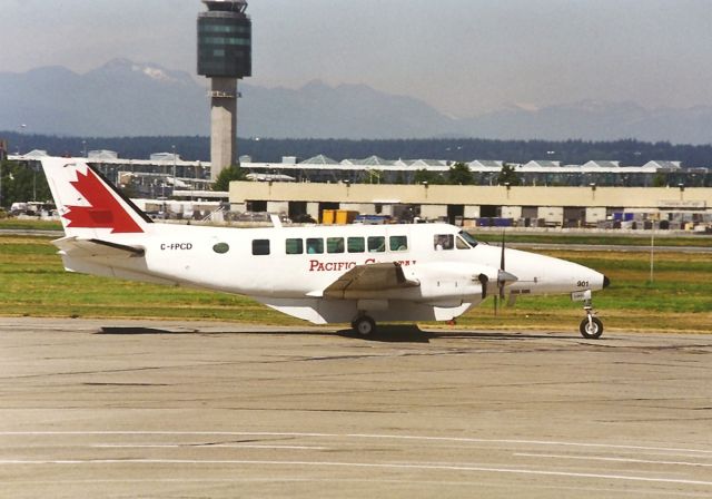 Beechcraft Airliner (C-FPCD) - one of many varied aircraft for Pacific Coastal. This view from the old terminal area at Vancouver BC...note the new tower and this view looking north.