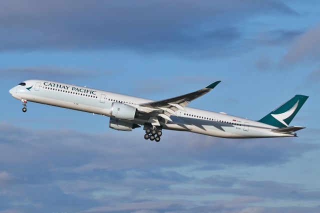 Airbus A350-1000 (B-LXI) - CPA216 caught by a crosswind just after departure leans a little to starboard