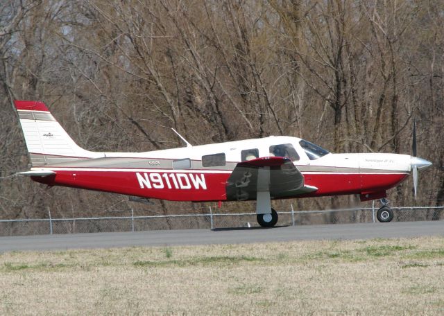 Piper Saratoga (N911DW) - Starting to roll down runway 14 at the Shreveport Downtown airport.