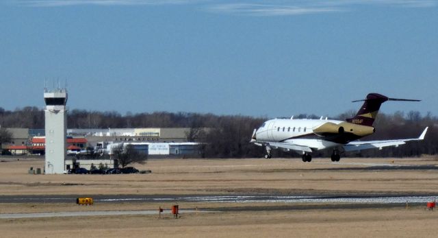 Bombardier Challenger 300 (N335AF) - About to touch down is this 2009 Bombardier Challenger 300 from the Winter of 2022.