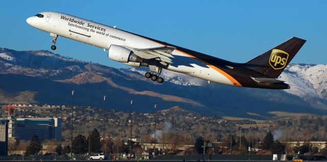 Boeing 757-200 (N402UP) - The pilots have this UPS B752 on a power climb away from runway 16R and headed for the wild blue yonder in this shot taken at 8 AM this morning ( 2 Jan 19). N402UP, making its first trip of the new calendar year, was departing Reno to complete the second half of an early morning Sacramento Mather - Reno Tahoe International - Phoenix Sky Harbor (KMHR-KRNO-KPHX) route.  