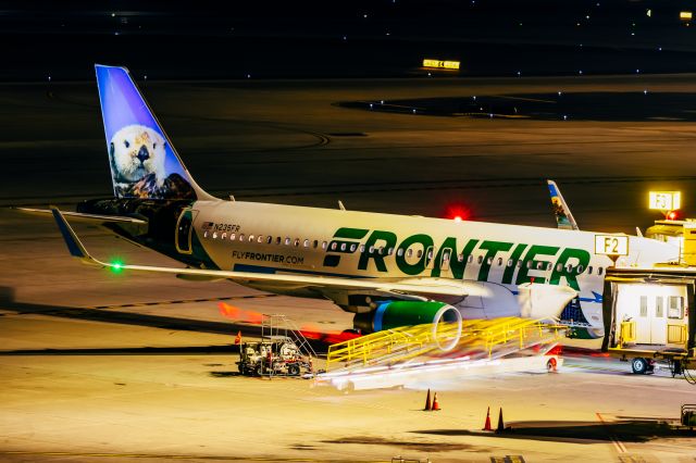 Airbus A320neo (N235FR) - Frontier Airlines A320neo "Pike the Otter" parked at PHX on 1/6/22. Taken with a Canon R7 and Tamron 70-200 G2 lens. 30 second long exposure photo.