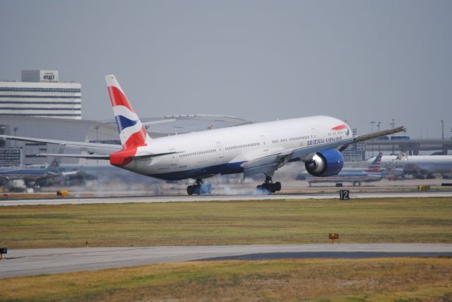 BOEING 777-300 (G-STBK) - A British Airlines Boeing 777-300 greasing it at KDFW. 