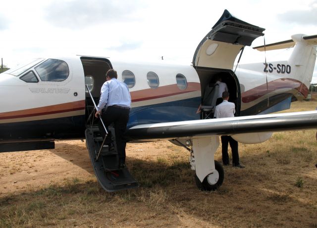 Pilatus PC-12 (ZS-SDO) - At Hoetspruit civil airport, South Africa.