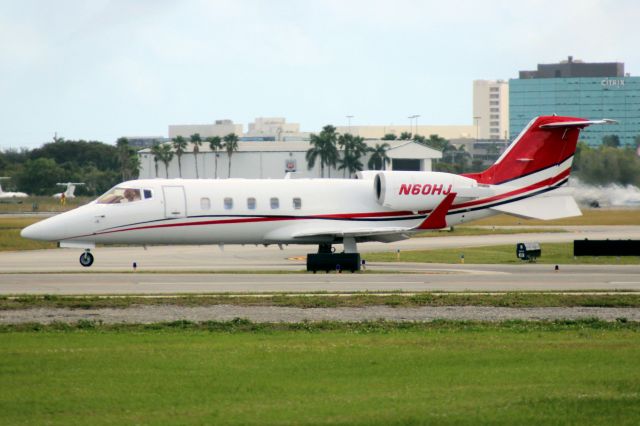 Learjet 60 (N60HJ) - Hop-a-Jet Learjet 60 lining up to depart rwy 9 on 13-Jan-17 heading for KMMU as HPJ60.